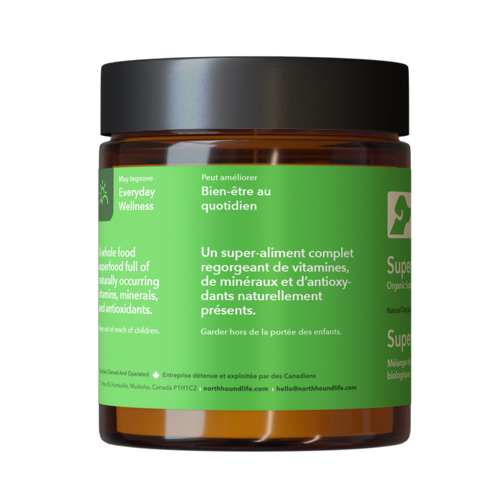 Super Greens supplement for dogs in amber glass jar with matt black cap, jar is wrapped in vibrant green label with white and black text