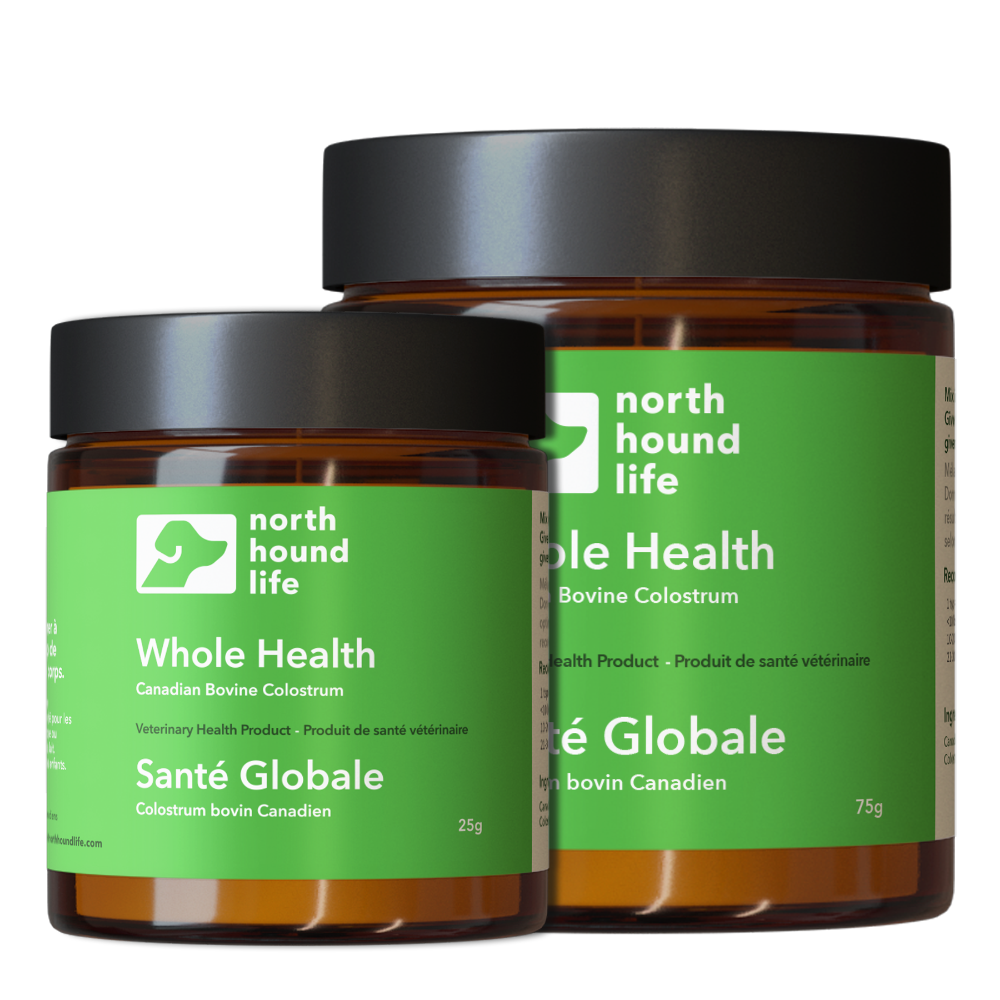 Two jars of 'north dog life' Whole Health product on a white background